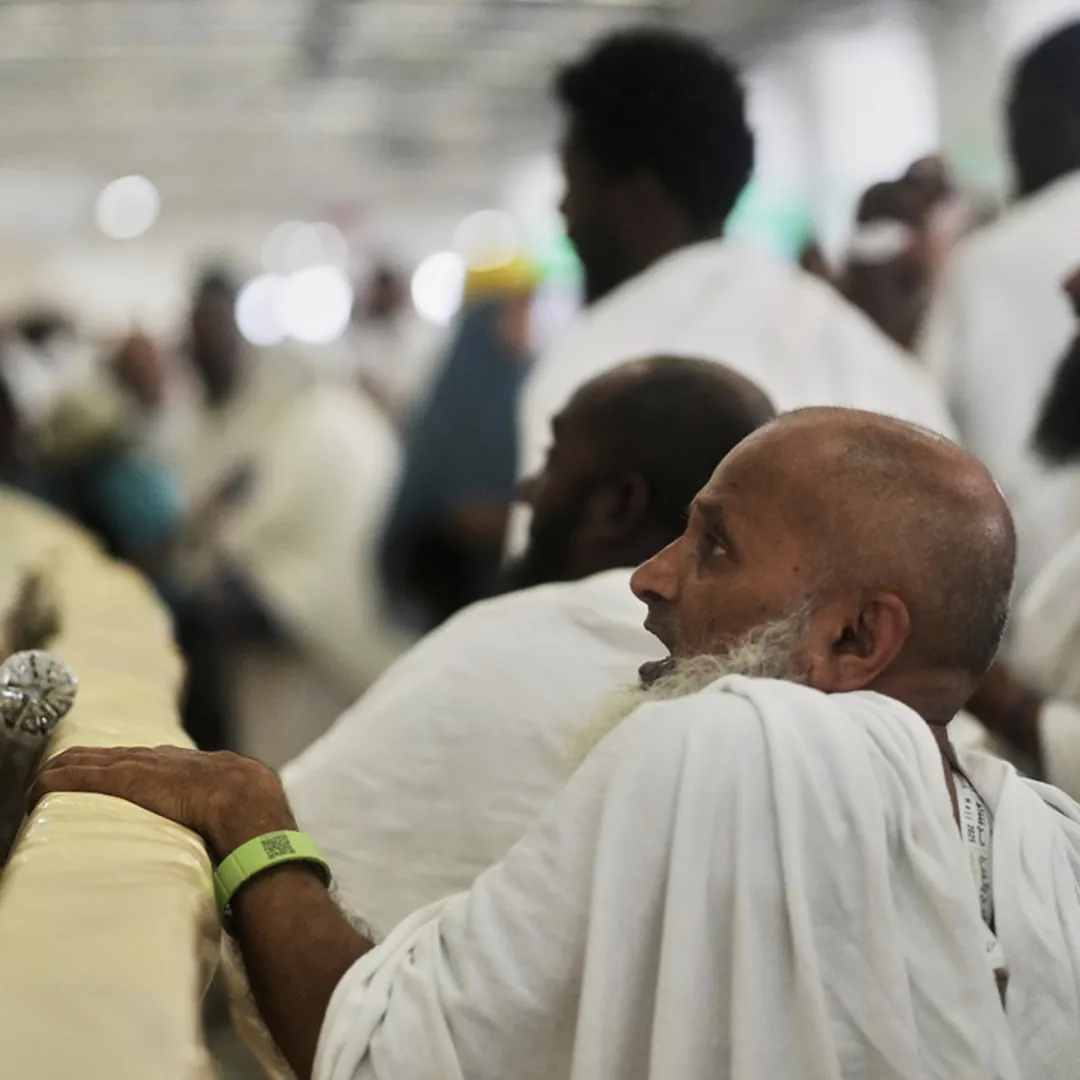 Hajj pilgrim performing Jamarat ritual during the sacred Hajj journey