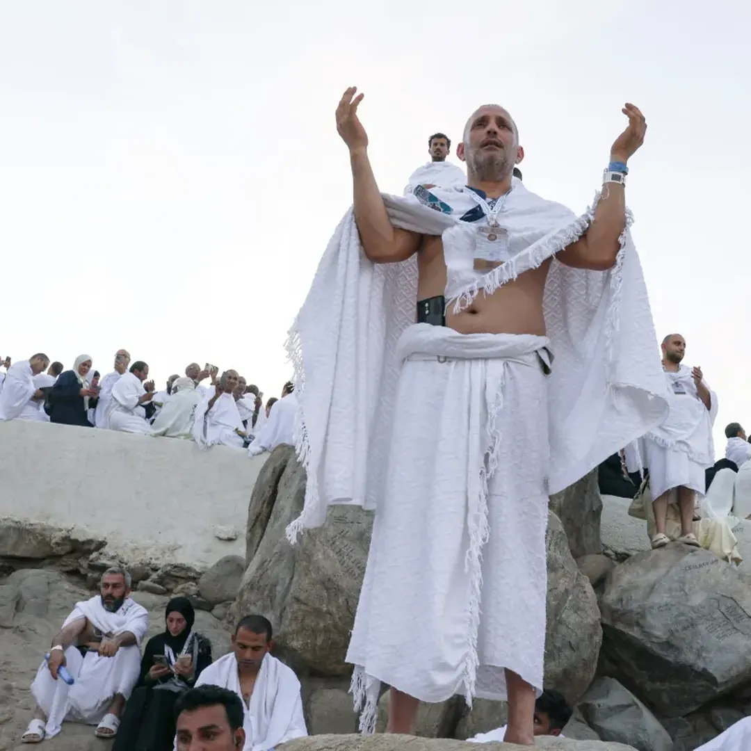 Pilgrim praying on Mount Arafat during the Hajj pilgrimage from Bangladesh